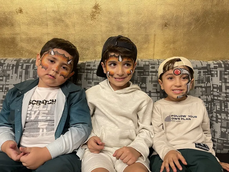 Face painting at an outdoor Fulshear TX event
